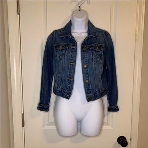 Dark wash denim jacket.